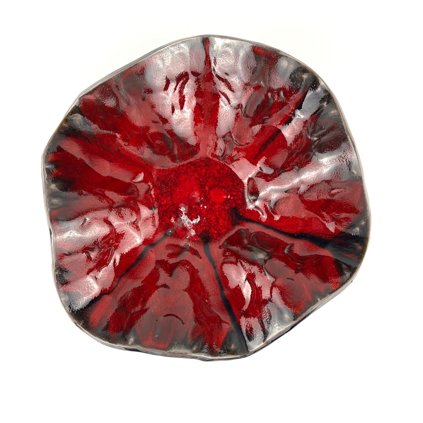 Top view of the glossy rich red interior of a handmade large-sized ceramic bowl.