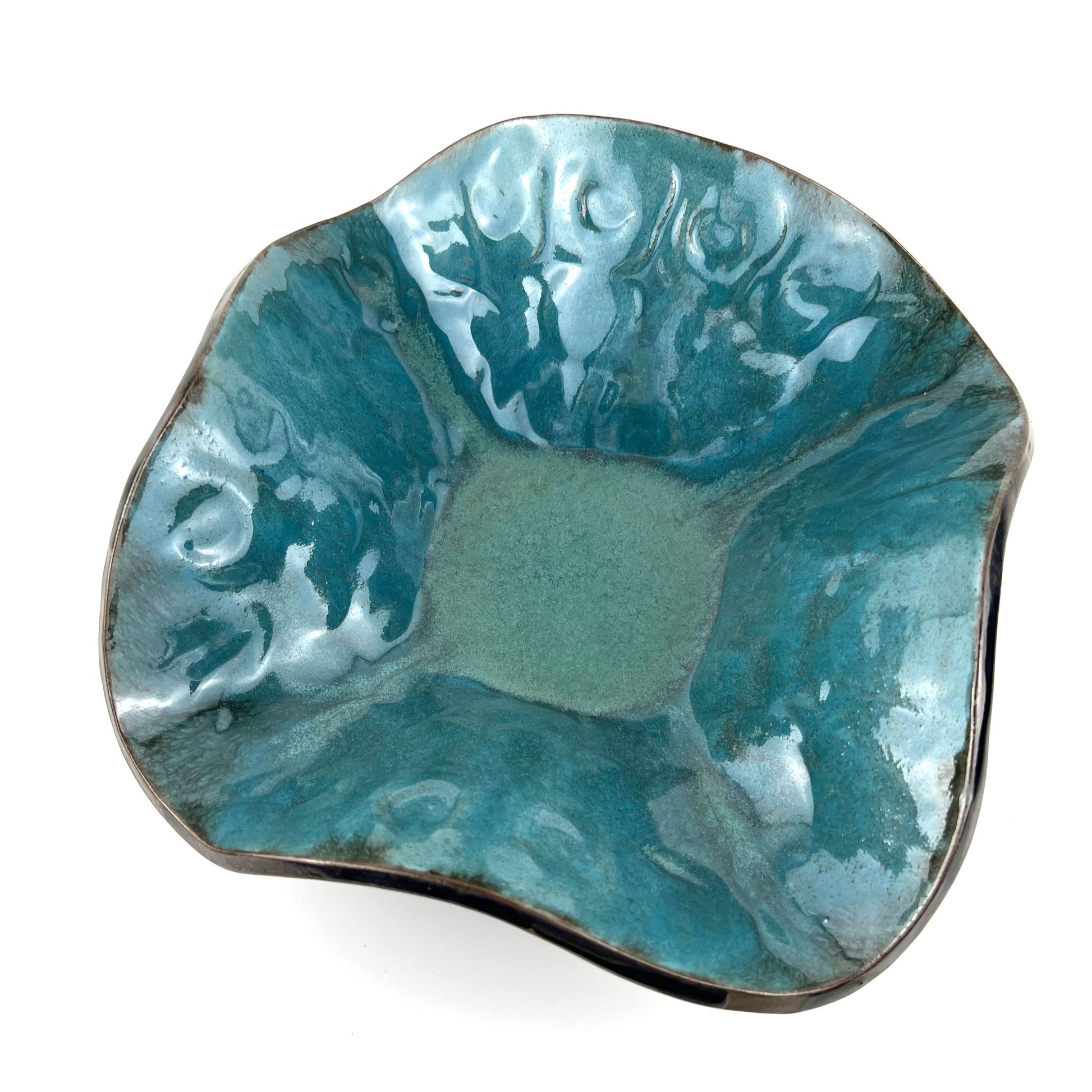 Handmade medium-sized decorative ceramic bowl with a glossy turquoise interior and textured hand and ant design.